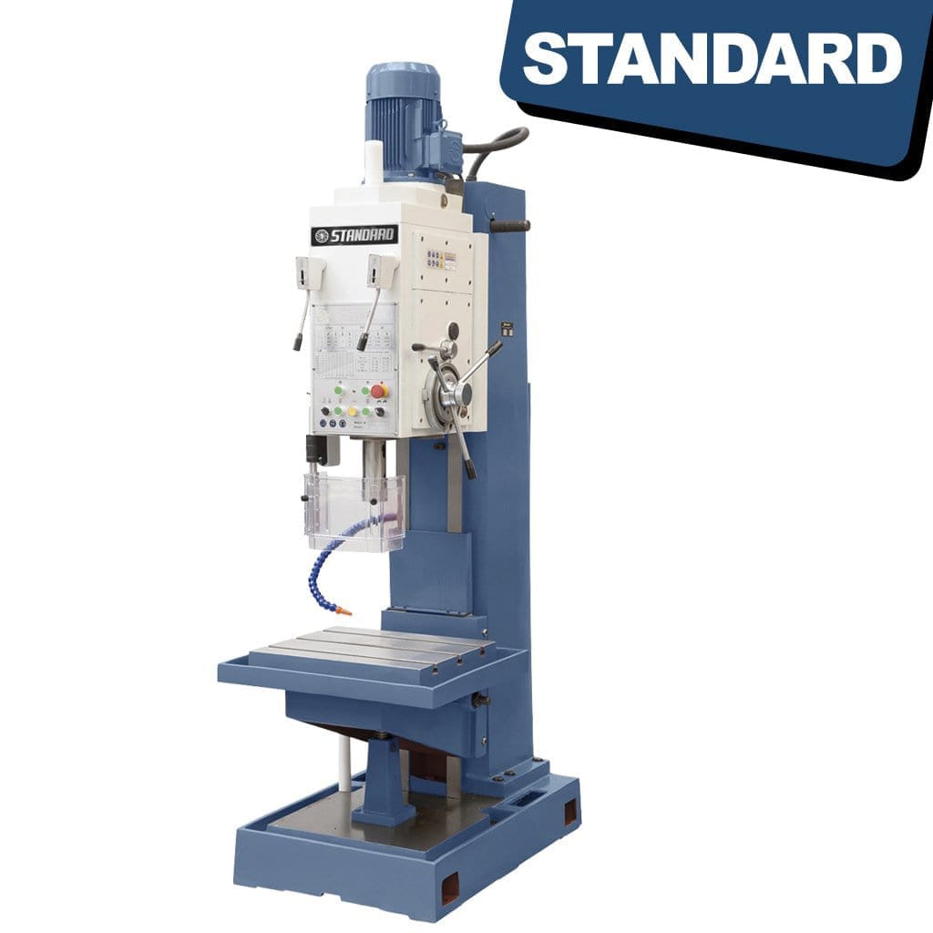 A heavy-duty column-type drilling pedestal machine, the STANDARD DC-50. The machine consists of a robust vertical column with a drilling head at the top, equipped with controls and a sturdy base. The device is designed for industrial-grade drilling operations, featuring a powerful motor, adjustable settings, and precision components.