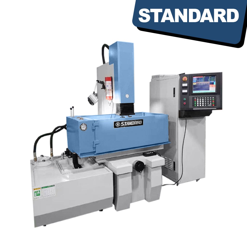 STANDARD EDS-500x400 CNC Spark Eroder, an industrial machining tool. The photograph features a metallic machine with control panels and components, emphasizing its precision in material removal through electrical discharges. Situated in a workshop setting, the CNC Spark Eroder is designed for specialized machining tasks, serving industrial applications with its advanced capabilities