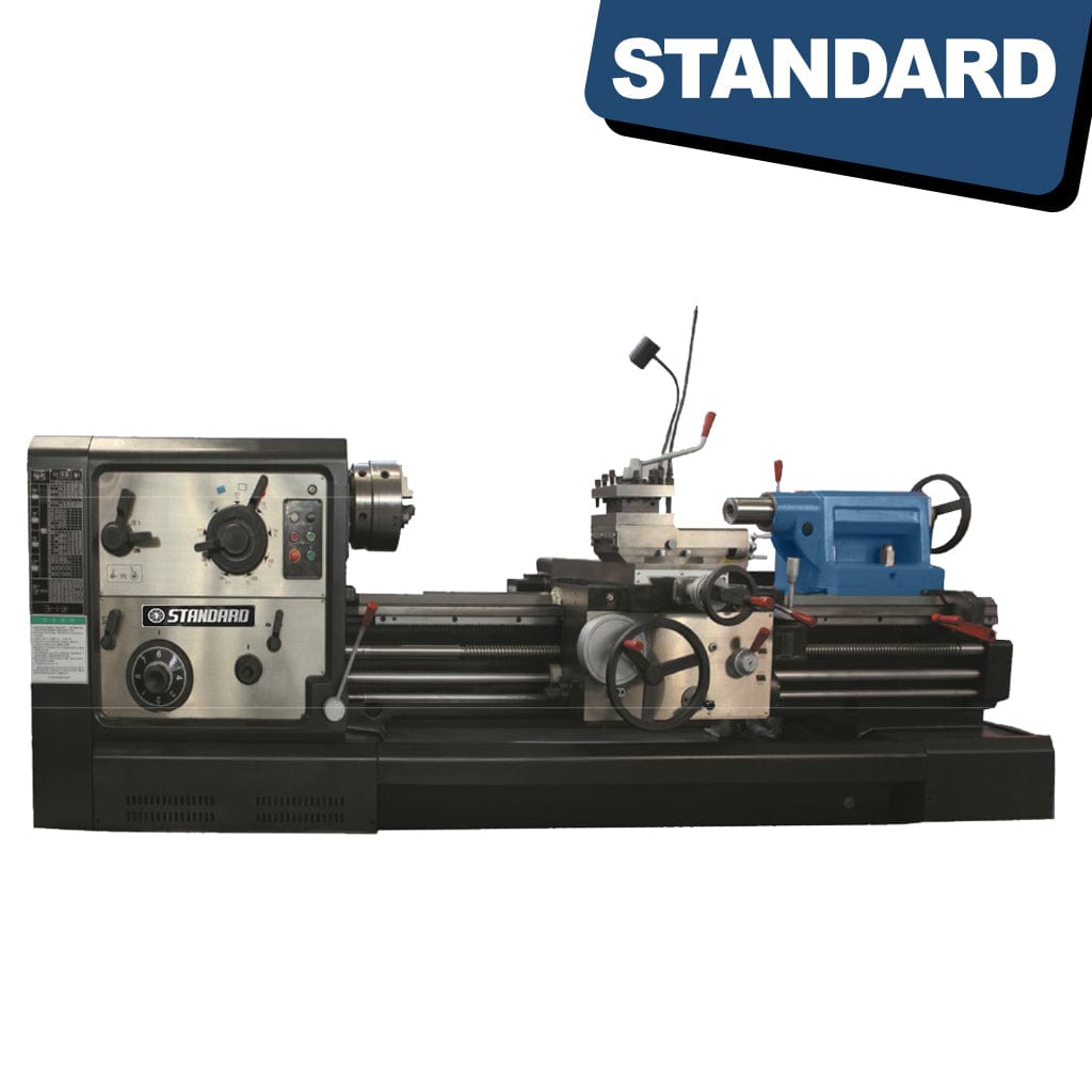 STANDARD TC-630x4000 Heavy Duty Lathe - 2Ton Capacity, a large industrial machine used for shaping metal and other materials. The lathe is built for heavy-duty work and has a 2-ton capacity