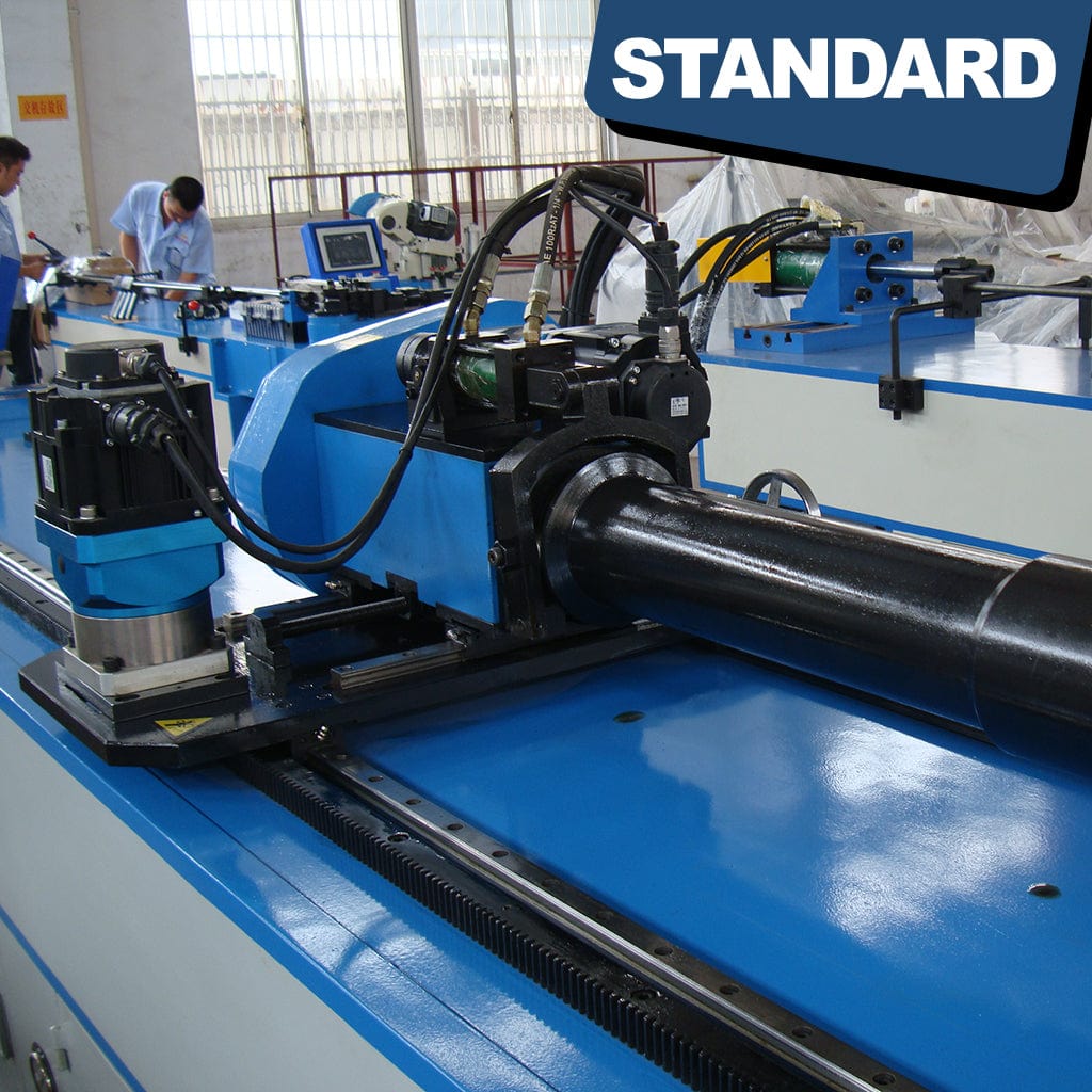 The mechanical part of the STANDARD BTS-89 3-Axis Servo Mandrel CNC Tube Bender consists of metal tubing positioned within the machine. The bender showcases precision servo motors and moving components responsible for bending the tubes accurately at various angles.