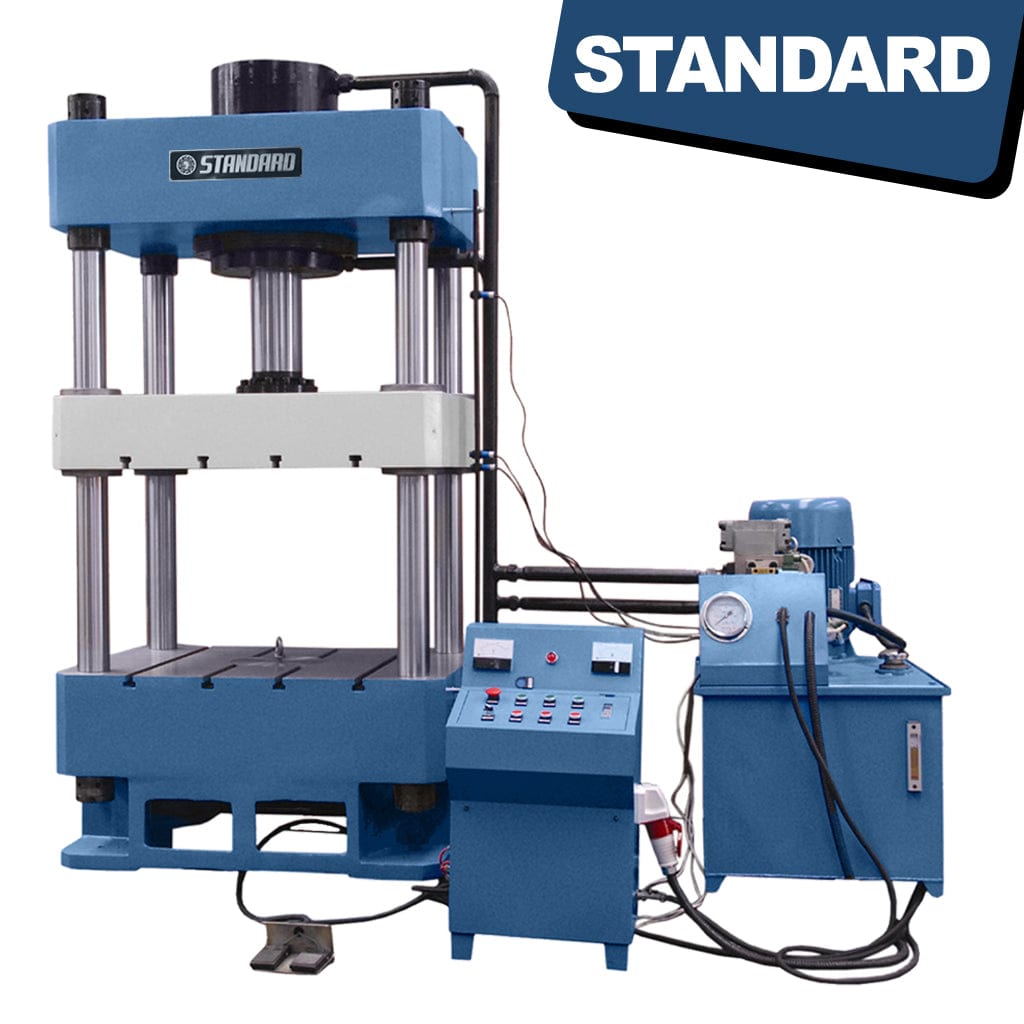 A yellow STANDARD H4P-1250 ton 4-post Hydraulic Press, a powerful industrial machine with a substantial frame, hydraulic cylinders, and control panel used for heavy-duty material pressing and forming tasks.