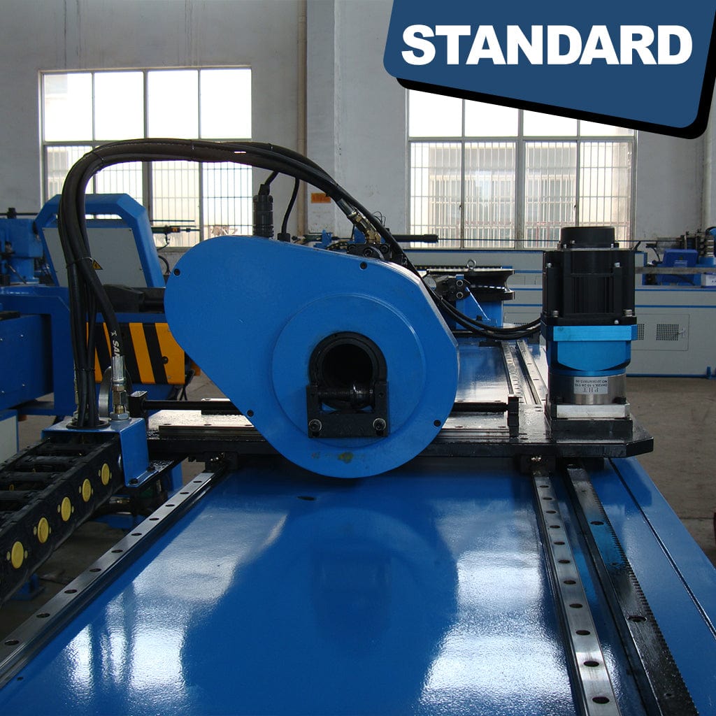 Parts of the STANDARD BTS-114 3-Axis Servo Mandrel CNC Tube Bender including bending dies, clamps, mandrels, and other components used in tube bending processes for manufacturing.